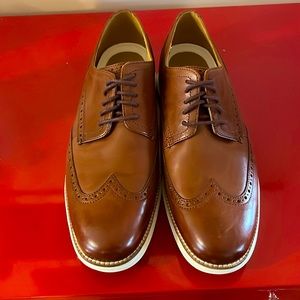 Brand new without tags or box. Size 10.5 Cole Haan wingtip Oxford dress shoes.